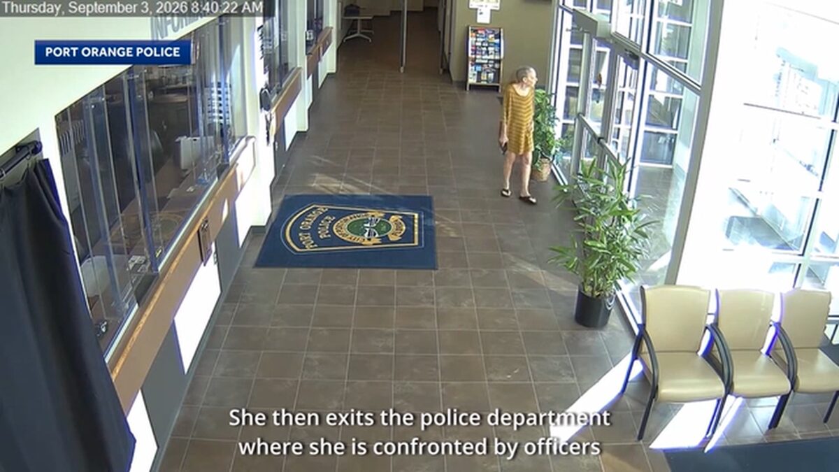 Video released by the Port Orange Police Department shows officers firing more than a dozen times at a 71-year-old woman who showed up armed with a gun.