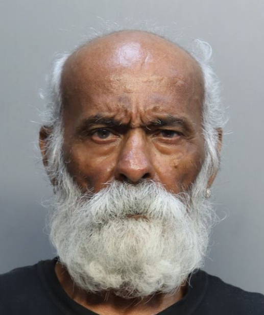 A 75-year-old man was arrested Tuesday after he walked into his bedroom while his wife slept and began to repeatedly stab her in the back