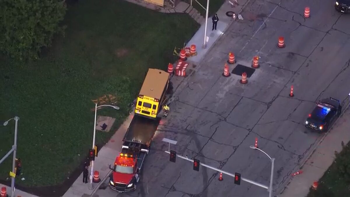 Police said a car and bus both traveled through the intersection and the car crashed into the bus