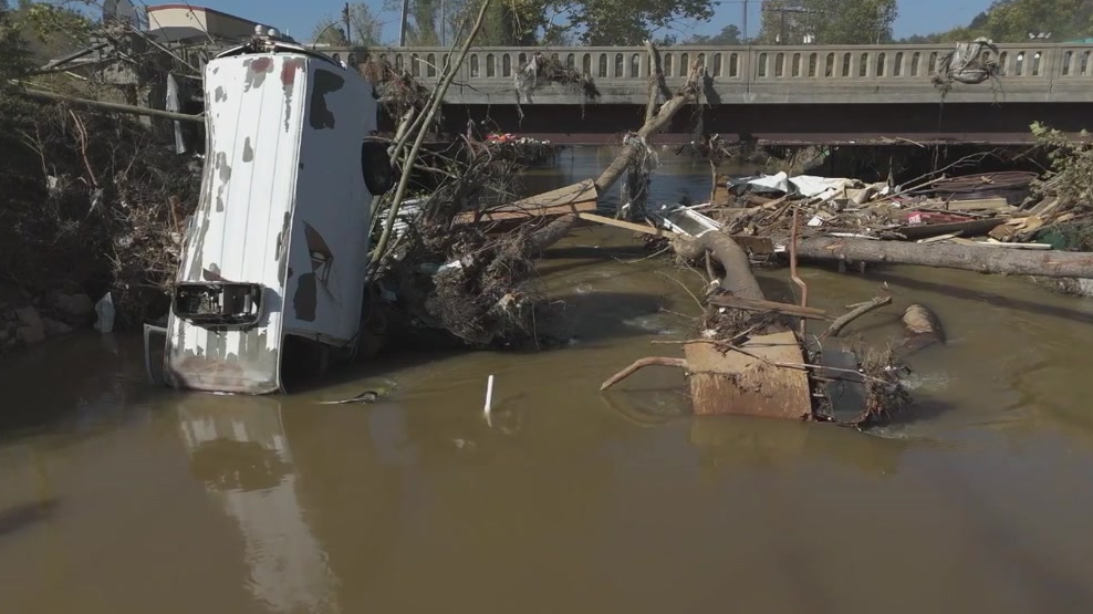 Debris in an Asheville river in the weeks after Helene in 2024