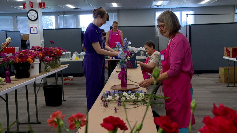 Volunteers and workers with Blooms of Kindness