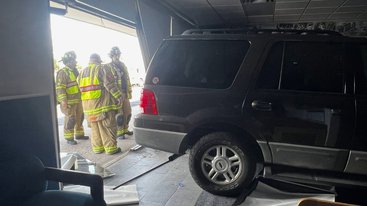 Car crashes into Colorado Springs building on North Academy Boulevard