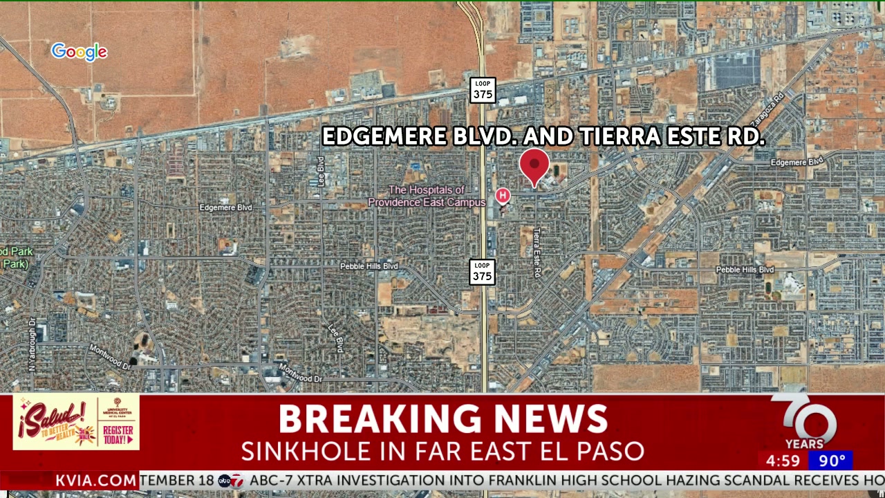 Sinkhole swallows police car after water main break near El Dorado High School