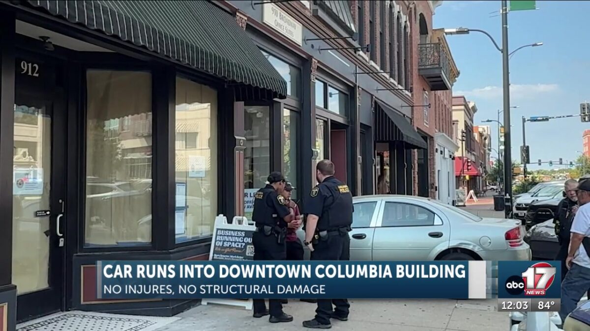 Car runs into downtown Columbia building