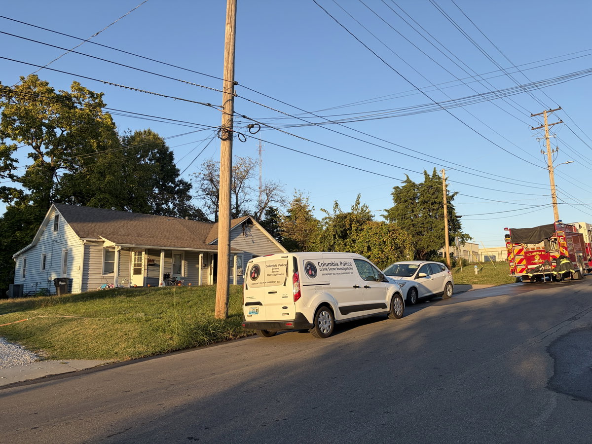 Crime scene van pulls up to Columbia house fire