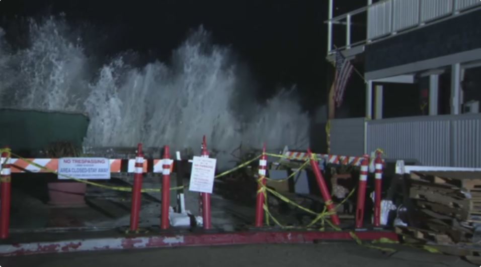 Powerful waves continued to slam the already-damaged Alamitos Peninsula Friday night as Tropical Storm Rachel caused more erosion