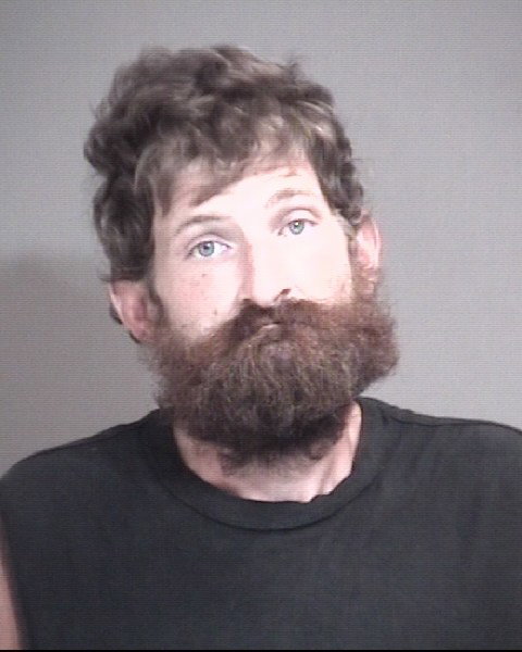 Man accused of stabbing his vehicle with knife
