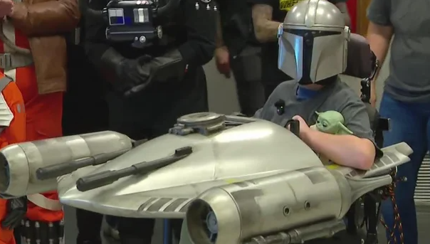 Dash Stanton's Halloween costume has a spacecraft attached to his power wheelchair