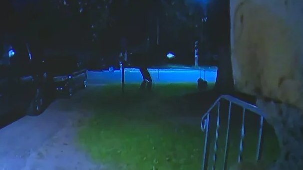 A suspect is seen in surveillance footage firing a gun on Harriet Avenue South overnight Tuesday in Bloomington