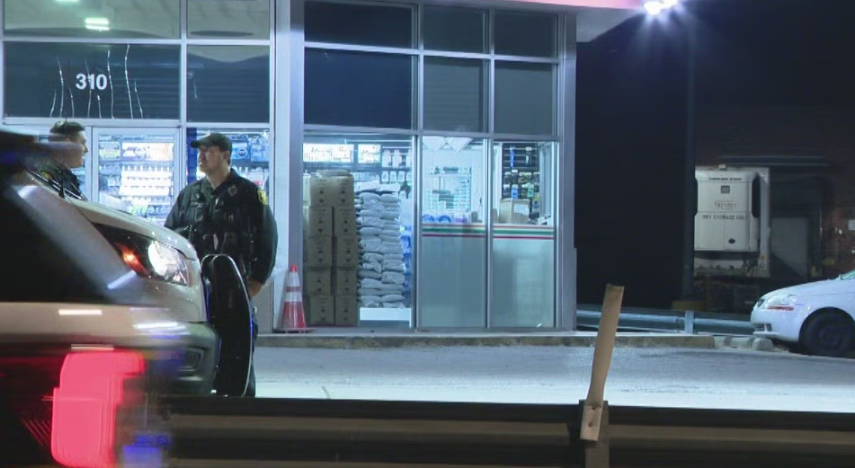 A man is facing charges after authorities say he chased and hit another man with a bat outside a gas station.