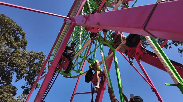 Workers build a ride at the Kiwanis Henry County Fair.